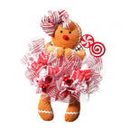 Gingerbread doll with candy cane hat and decorative mesh skirt on a white background