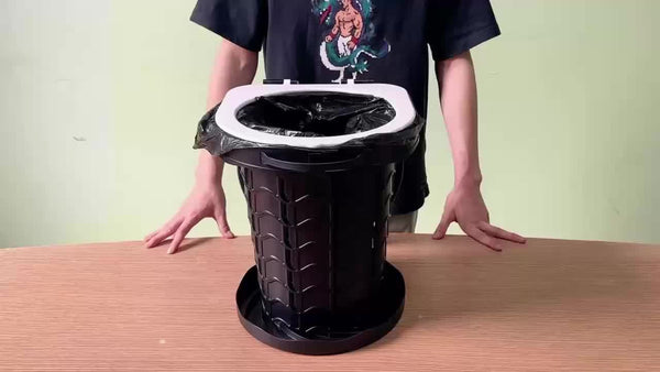 Black collapsible camping toilet, portable outdoor toilet, camping furniture Australia, lightweight camping gear, compact toilet for travel, camping sanitation solution