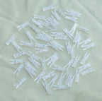 Yansanido 100pcs Mini Clear Plastic Utility Paper Clip, Clothespins Clips, Clothes Line String Clips, mini Clothes Pins for Photo for String Fairy Lights Color Clear(100pcs Clear Plastic Clips)